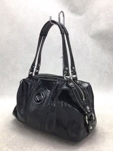 コーチ(COACH) 最新作 オードリー パーフォレイテッド ラージ ポーチ