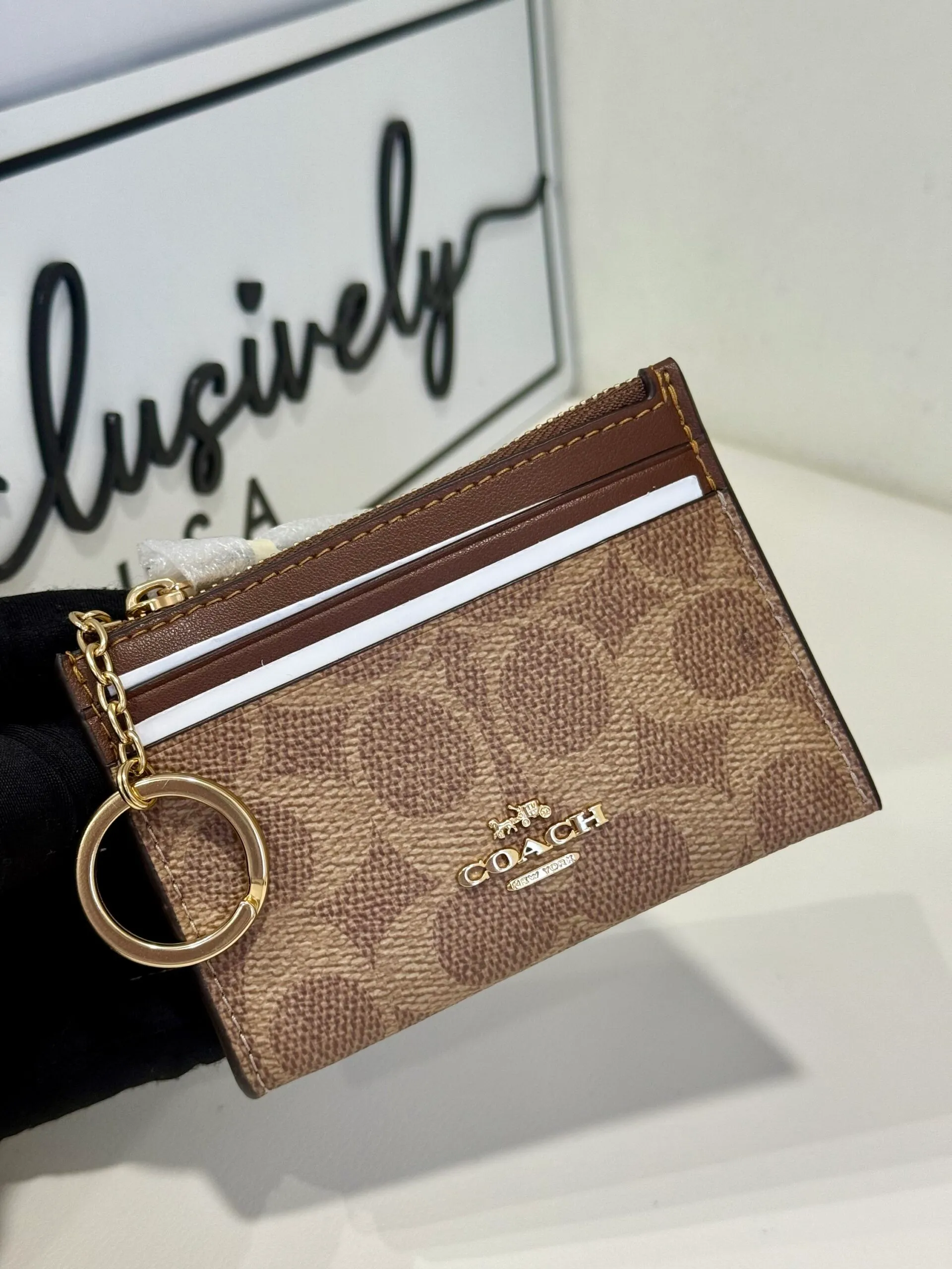 コーチ(COACH) 最新作 シグネチャー オセロット スキニー コインケース